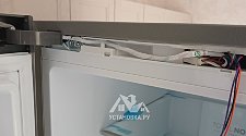 Перенавесить двери холодильника