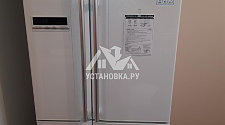 Установить отдельностоящий холодильник с перевесом дверей (с эл. блоком)