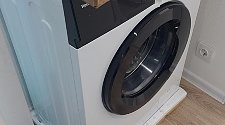Установить отдельностоящую стиральную машину