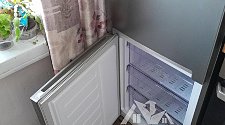Установить холодильник и перенавесить на нём двери