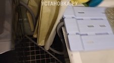 Установить/подключить стирально-сушильную машину.
