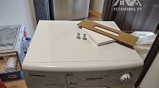 Демонтировать и установить отдельно стоящую стиральную машину Канди в ванной комнате