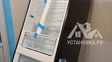 Перенавесить двери холодильника
