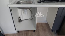 Установить отдельностоящую стиральную машину