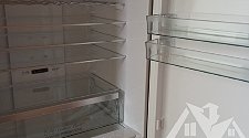 Перенавесить двери холодильника