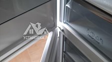 Перенавесить двери холодильника