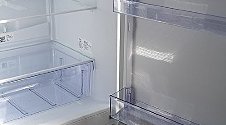 Установить новый отдельно стоящий холодильник