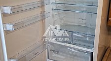 Установить холодильник и перенавесить на нём двери